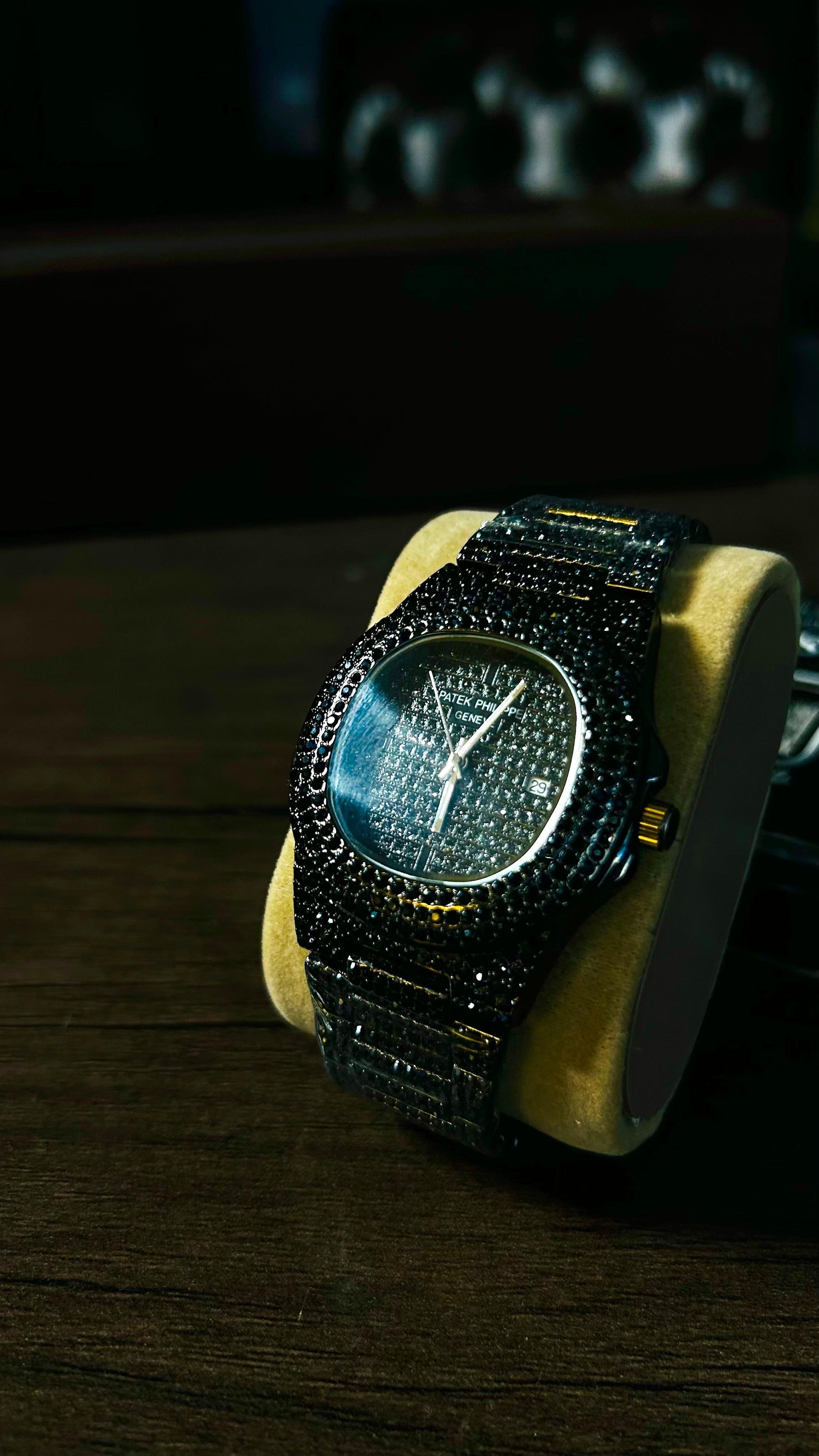 Black iced-out Patek-style watch