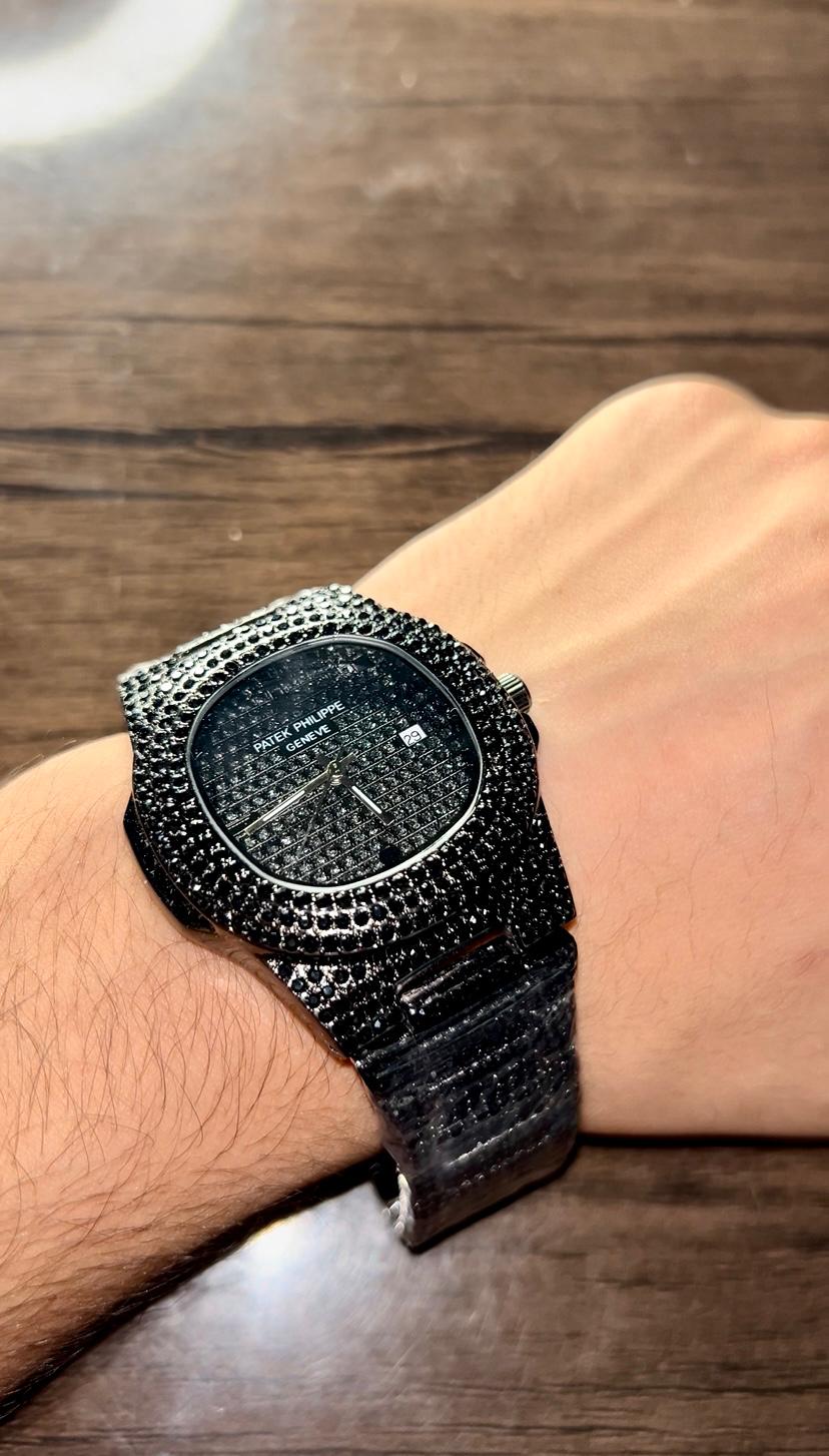 Black iced-out Patek-style watch